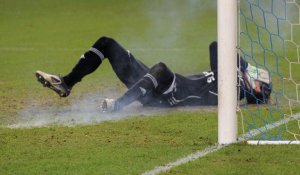 Shunin lies helpless after being struck by a firecracker