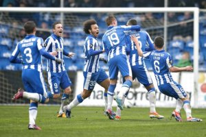 Toutouh and his teammates celebrate his wonder strike  (Image from Getty)