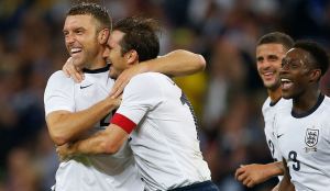 Lambert celebrates scoring against Scotland  (Image from Getty)