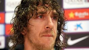 Puyol during yesterday's conference (Image from Getty)