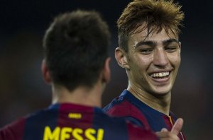 Munir celebrates his goal with Messi  (Image from AFP)