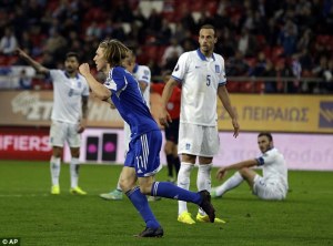 Joan Edmundsson celebrates his goal against Greece  (Image from AFP)