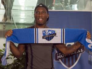 Immediate Impact - Drogba signs (Image from Getty)