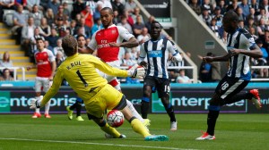 Walcott suffered in the lone striker role (Image from Reuters / Andrew Yates Livepic)