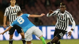Paul Pogba battles for possession against Napoli (Image from Getty)