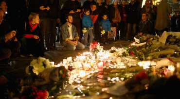 Mourners gather outside the Bataclan Concert Hall (Photo by Christopher Furlong/Getty Images)