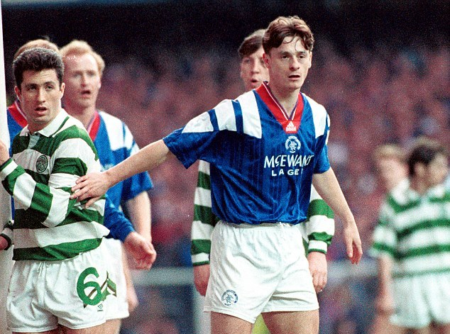 Robertson keeps an eye on Celtic's John Collins during an Old Firm derby (Image from Tumblr)